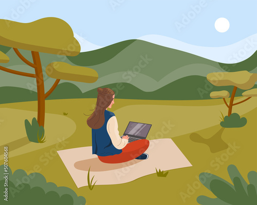 Happy young woman sitting on blanket in nature and surfing internet. Freelancer working on laptop outdoors. Working away from home. Color flat vector illustration photo