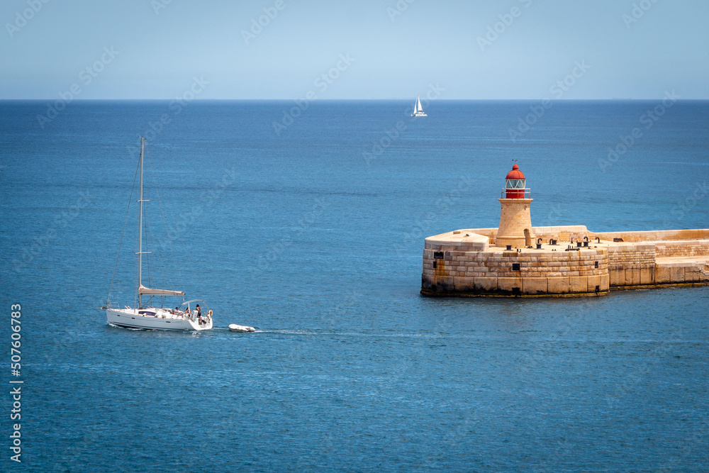 Sailing Boats near breakwater grand harbor Malta