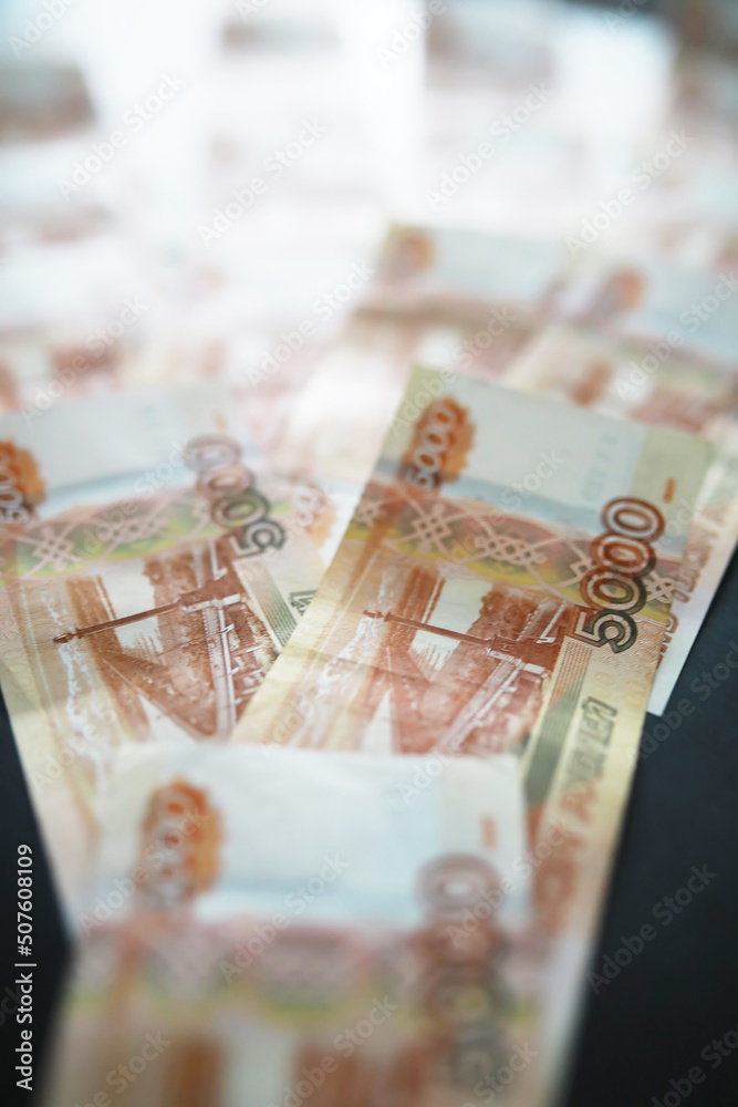 Russian money face value of five thousand rubles. Close-up of Russian rubles . The concept of Finance.Background and texture of money Russian money face value of five thousand rubles. Close-up of Russian rubles . The concept of Finance.Background and texture of money