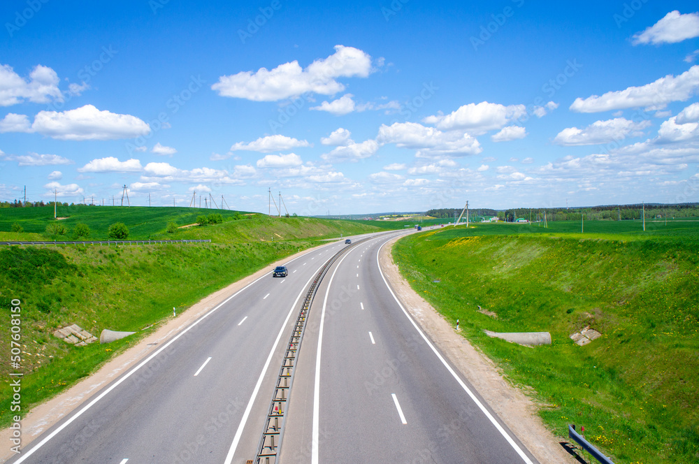 Beautiful landscape with road and highway on a sunny day. 25 May 2020, Minsk, Belarus