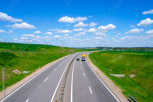 Beautiful landscape with road and highway on a sunny day. 25 May 2020, Minsk, Belarus © Payllik