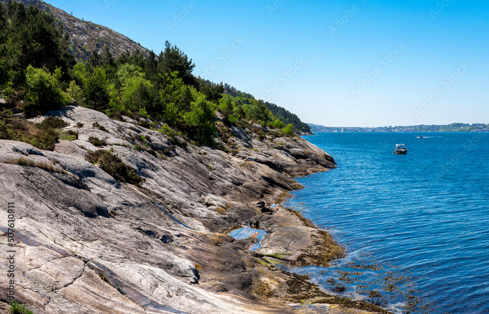 Coastline of Lifjel mountain slope and Gandsfjord fjord while hiking along the mountain on return to Dale, Sandnes, Norway, May 2018