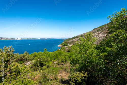 Obraz na płótnie Hiking on slopes of Lifjel with a view to Gandsfjord and Stavanger city, Sandnes, Norway, May 2018 w salonie