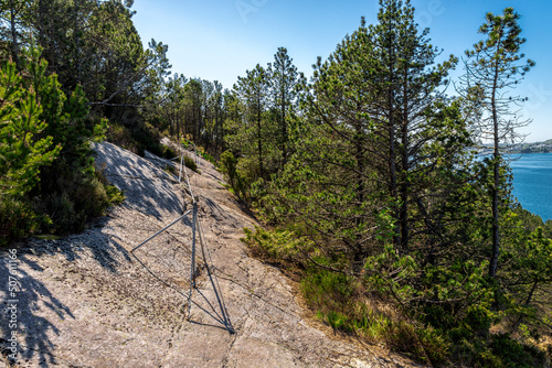 Obraz na płótnie A metal cable along a trek route to Lifjel mountain for hikers to hold, Sandnes, Norway, May 2018 w salonie