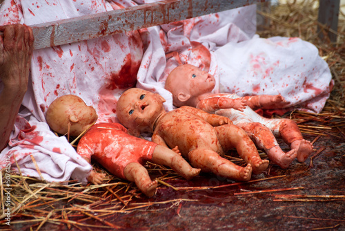 Closeup of blood on dolls for protesting against the speciesism photo