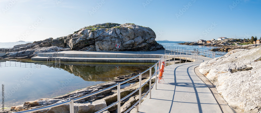 Fenced area of Sjobadet Myklebust swimming sea pool at Jasund Peninsula in Tananger, Norway, May 2018