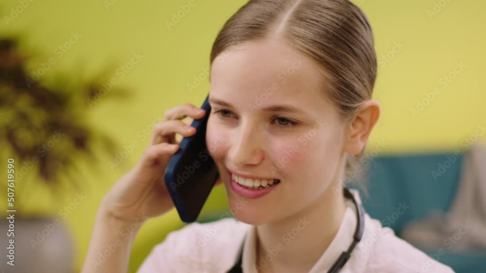 Portrait closeup of amazing beautiful woman make a call on the phone she working call centre agent Portrait closeup of amazing beautiful woman make a call on the phone she working call centre agent