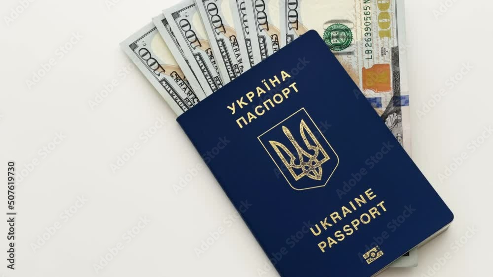 Ukrainian passport and money, biometric passport of a citizen of Ukraine and dollars. Ukrainian passport and money, biometric passport of a citizen of Ukraine and dollars.