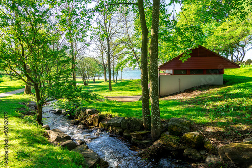 A small park with a water stream running to Hafrsfjord fjord near    Sverd i Fjell    monument  Stavanger  Norway  May 2018