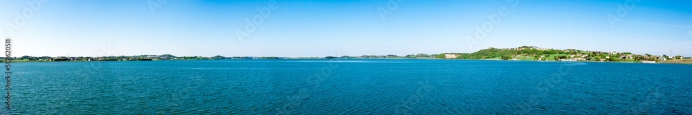 Panorama of Hafrsfjord bay and its coastline as seen from foreshore near Sword in Rock monument, Stavanger, Norway, May 2018