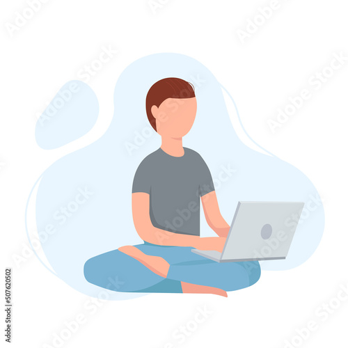 Boy in lotus position keeping calm and worling on laptop or computer. Meditation pose. Smm manager, programmer. Freelancer working on web and application development on computers. Software developers.