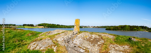 Obraz na płótnie Panoramic view to Halandsvatnet lake from a small hill with an old stone post, Stavanger, Norway, May 2018 w salonie