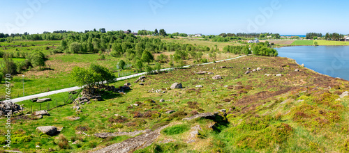 Obraz na płótnie Panorama of the countryside near Halandsvatnet lake with a remote sea view on a horizon, Stavanger, Norway, May 2018 w salonie