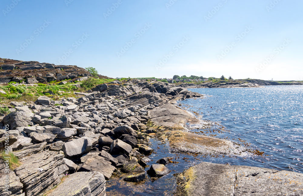 Scenic rocky coastline view in Kvernevik suburb, Stavanger, Norway, May 2018