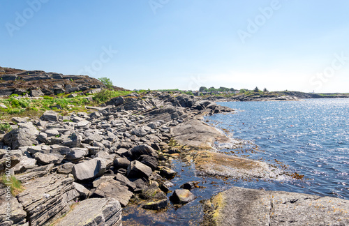 Scenic rocky coastline view in Kvernevik suburb, Stavanger, Norway, May 2018