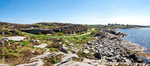 Obraz na płótnie Panorama of a coastline in Kvernevik suburb with a walking footpath, Stavanger, Norway, May 2018 w salonie