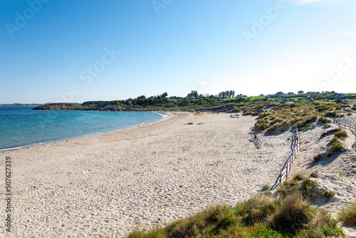 Obraz na płótnie Beautiful Olberg beach with shallow water safe for kids swimming in beginning of summer season, Stavanger, Norway, May 2018 w salonie
