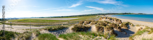 Obraz na płótnie Panoramic view to Sola airport runaway near the white sand beach strip, Stavanger, Norway, May 2018 w salonie