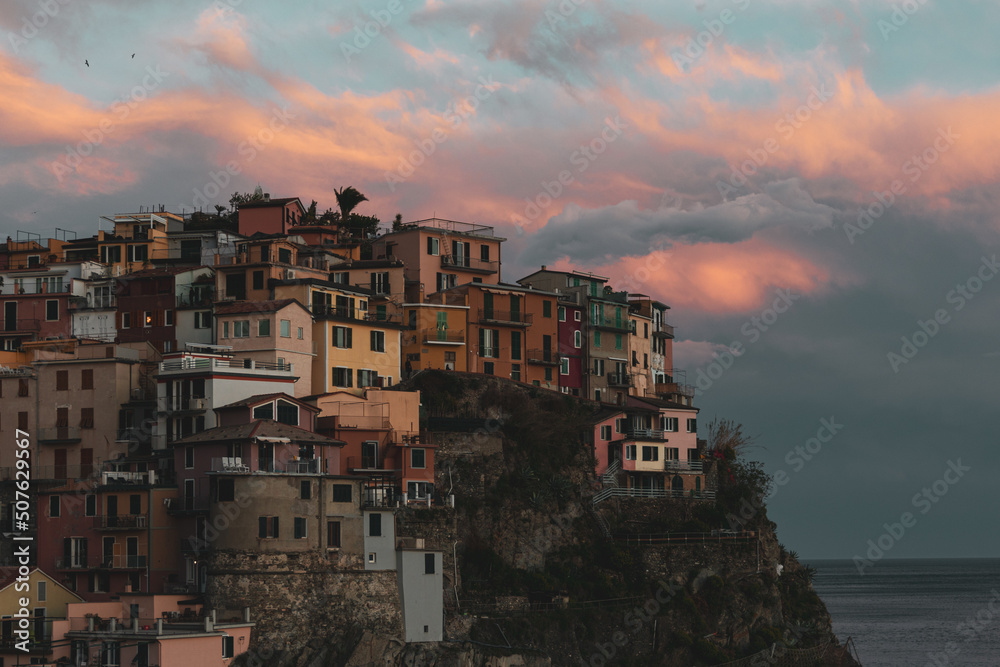 sunset over the village Manarola, Cinque Terre, italy sunset over the village Manarola, Cinque Terre, italy