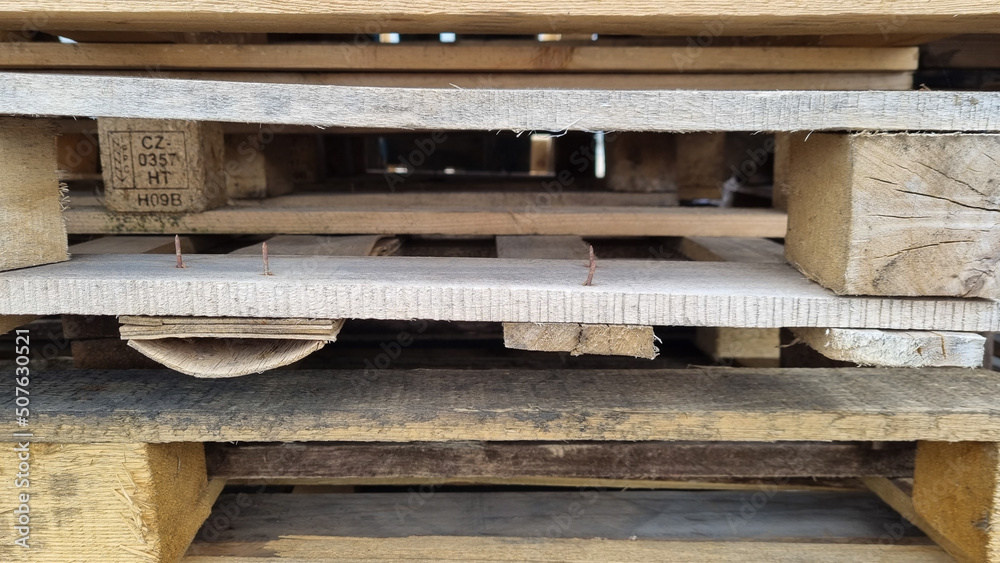 Abstract wooden background. Wooden pallet texture. Warehouse and distribution attributes. Abstract wooden background. Wooden pallet texture. Warehouse and distribution attributes.