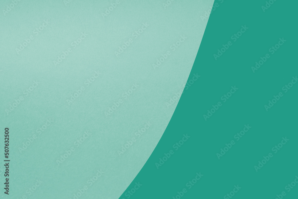 light and dark green and cyan blue paper texture background forming circle