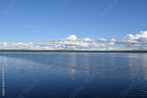 Light breeze on a lake in northern Russia on a warm summer day.