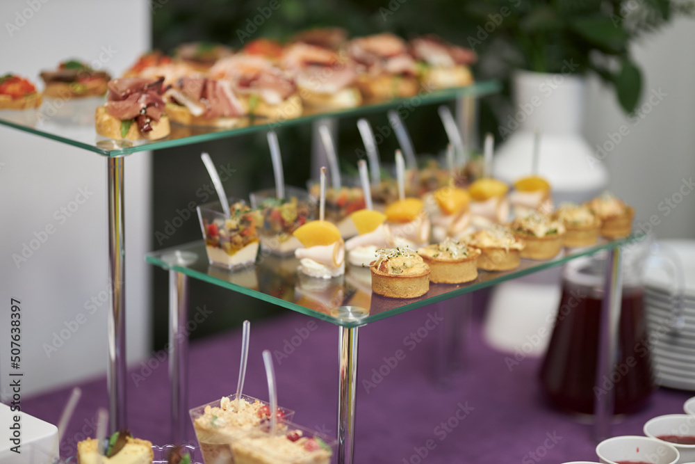 Delicious appetizers, sliced jamon, vegetables and flatbread .snacks 