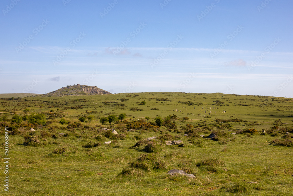 The Cheesewring on stowes Hills with the Hurlers at Minions on Bodmin Moor
