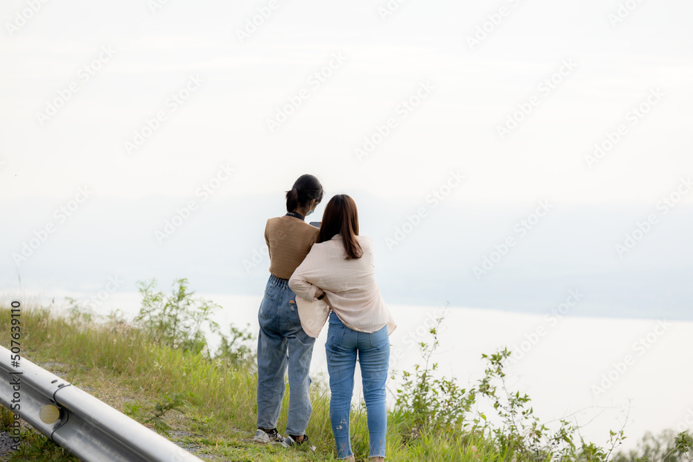 both male and female people walking and sitting on vacation with family Stay with beautiful nature, bright sky, green trees, good atmosphere. Khao Yai Thiang, Thailand Date 28-05-2022 both male and female people walking and sitting on vacation with family Stay with beautiful nature, bright sky, green trees, good atmosphere. Khao Yai Thiang, Thailand Date 28-05-2022