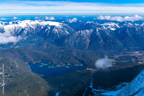 View from the Zugspitze to the surrounding mountain peaks and Eibsee (Tyrol, Austria/ Bavaria, Germany)