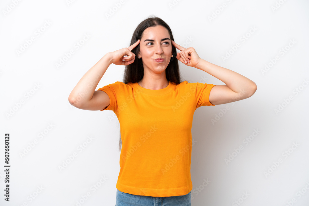 Young caucasian woman isolated on white background having doubts while scratching head Young caucasian woman isolated on white background having doubts while scratching head