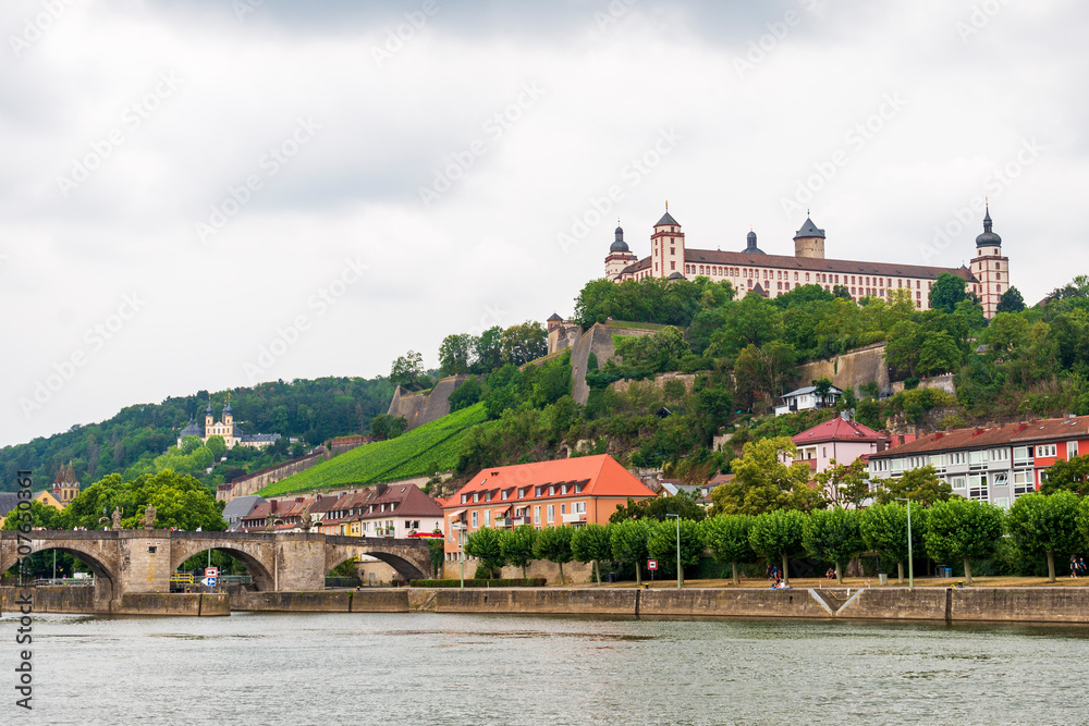 Historical built in Renaissance and Baroque styles Marienberg Fortress upon a vineyard hill above the Old Bridge and Main river seen from the other site of the river
