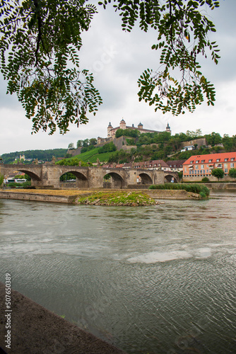 Historical built in Renaissance and Baroque styles Marienberg Fortress upon a vineyard hill above the Old Bridge and Main river seen from the other site of the river
