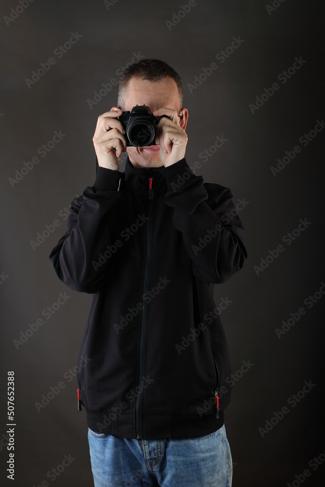 young man with photo camera young man with photo camera