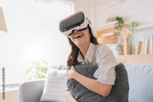 happiness exited asian female teen hand wave along with her virtual concert performance via virtual goggle virtual interactive headset,asia woman stay home innovation technology lifestyle vr at home