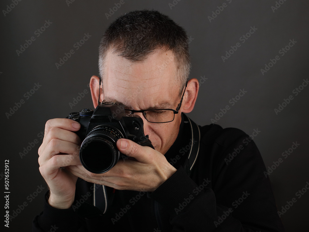 young man with photo camera young man with photo camera