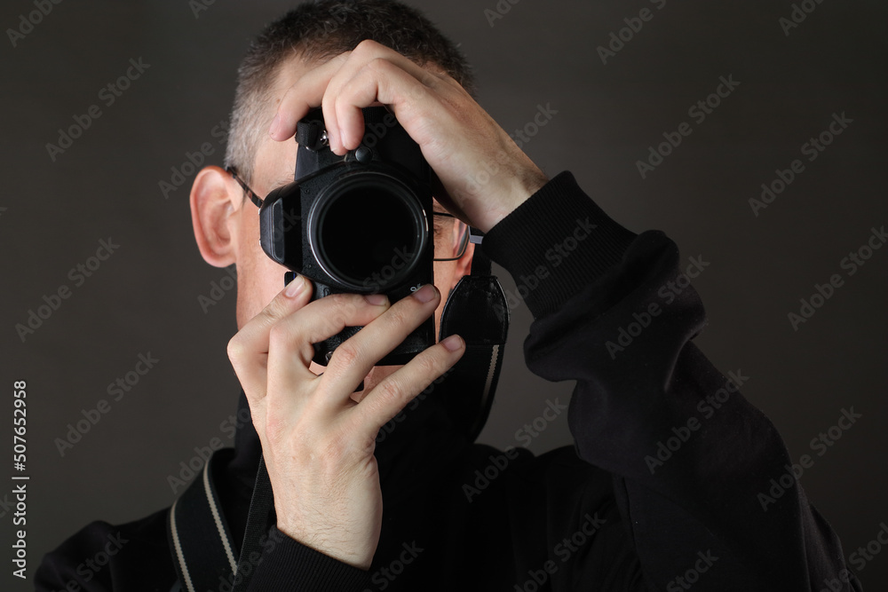 young man with photo camera young man with photo camera