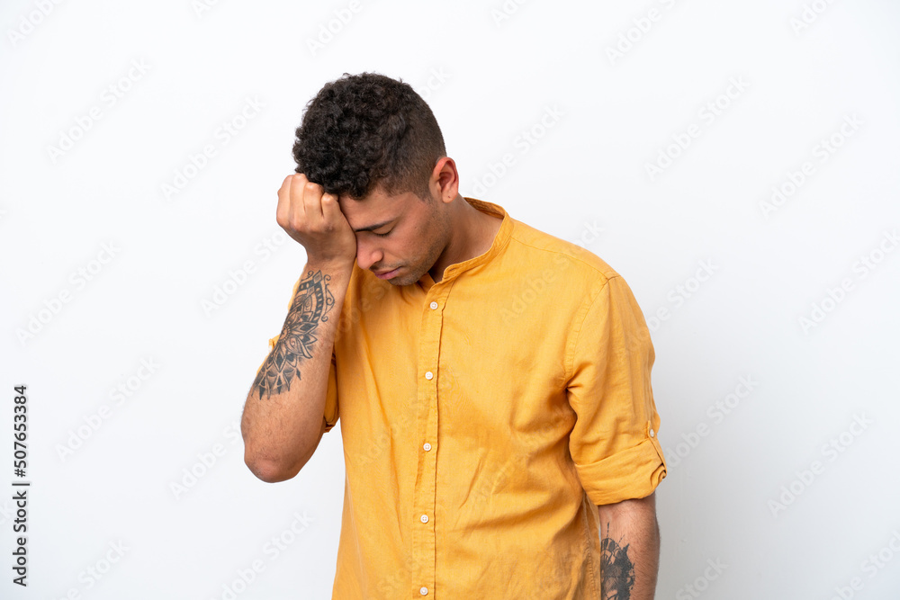 Young caucasian Brazilian man isolated on white background with headache Young caucasian Brazilian man isolated on white background with headache