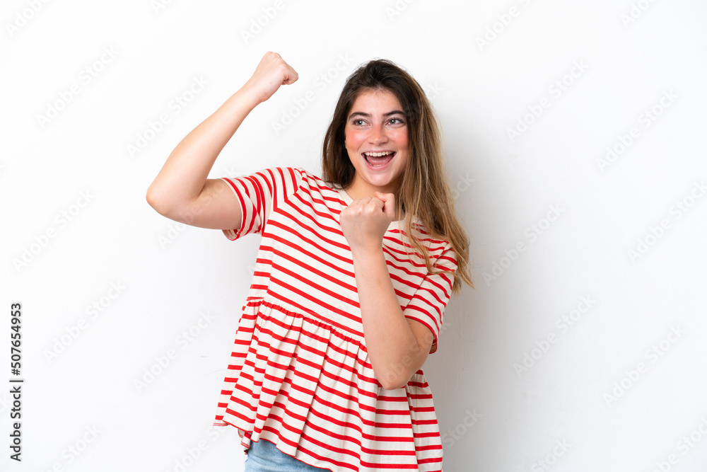 Young caucasian woman isolated on white background celebrating a victory Young caucasian woman isolated on white background celebrating a victory