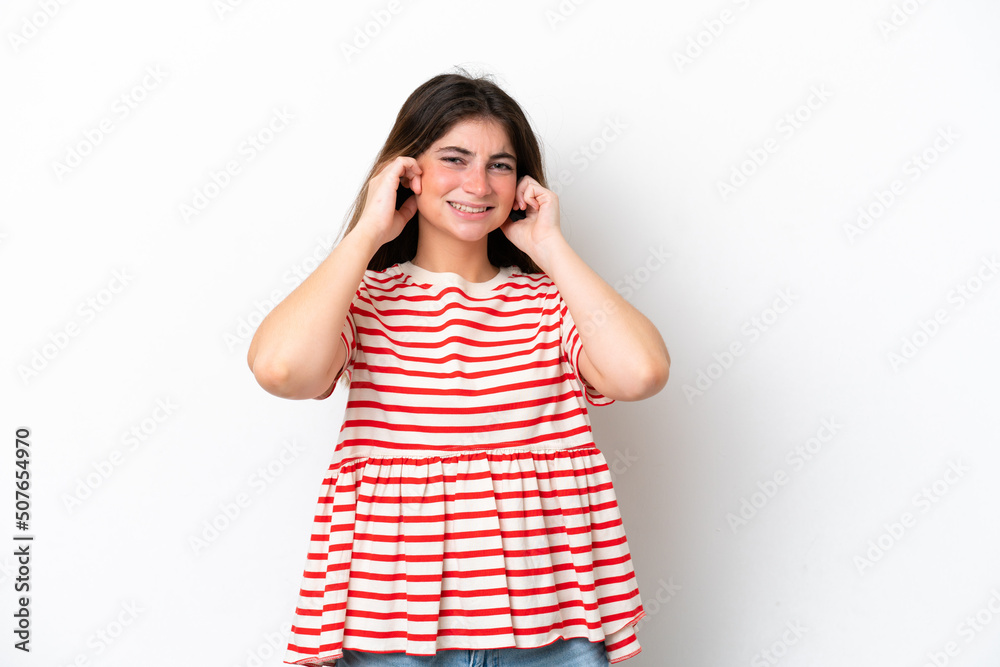Young caucasian woman isolated on white background frustrated and covering ears Young caucasian woman isolated on white background frustrated and covering ears
