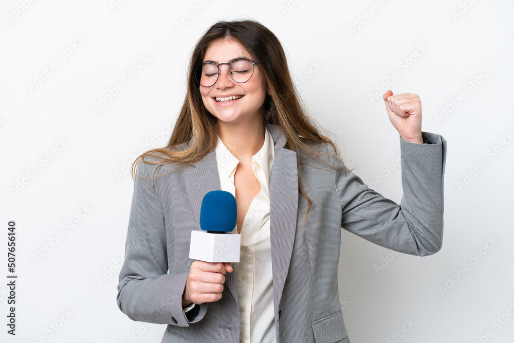 Young caucasian TV presenter woman isolated on white background doing strong gesture Young caucasian TV presenter woman isolated on white background doing strong gesture