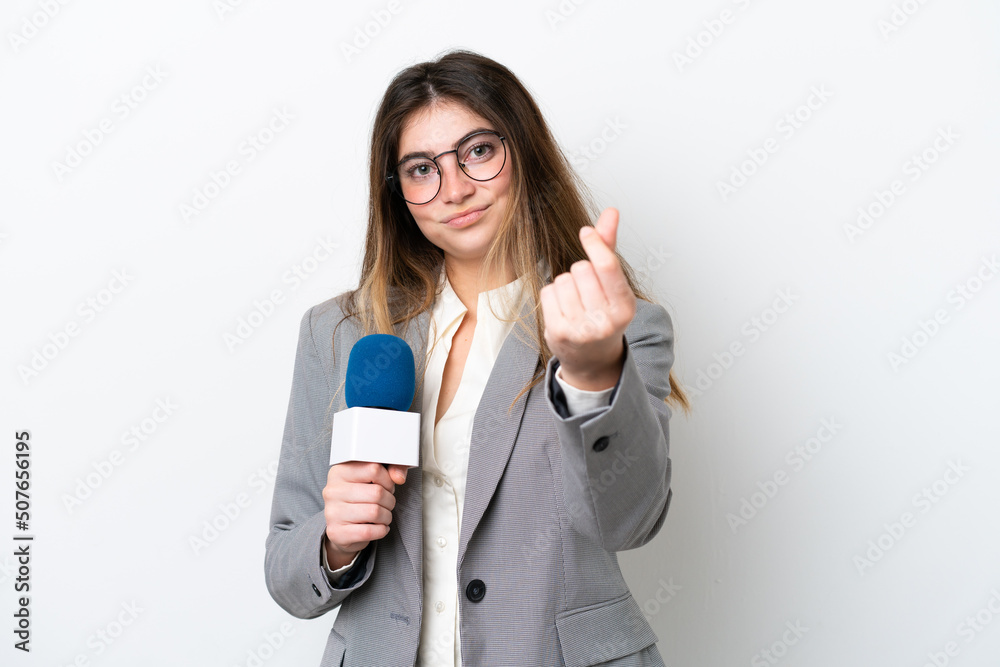 Young caucasian TV presenter woman isolated on white background making money gesture Young caucasian TV presenter woman isolated on white background making money gesture