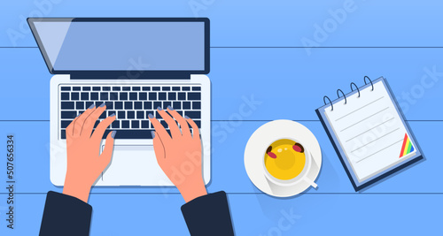 person typing on a laptop