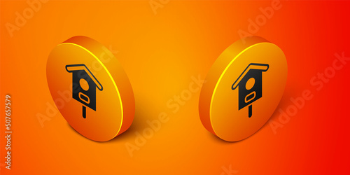 Isometric Bird house icon isolated on orange background. Nesting box birdhouse, homemade building for birds. Orange circle button. Vector