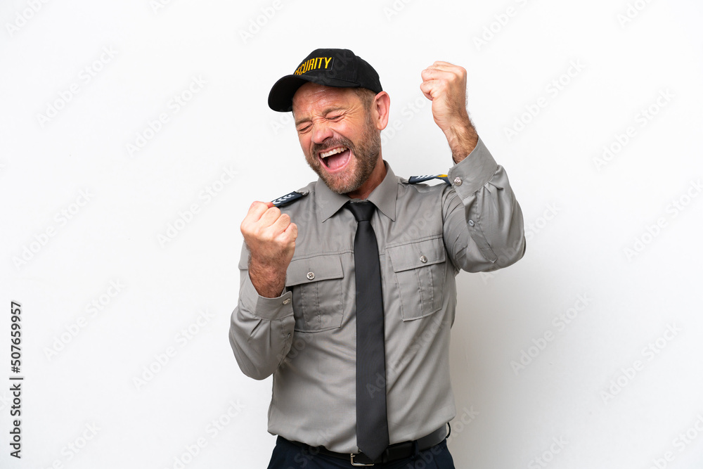 Middle age security man isolated on white background celebrating a victory Middle age security man isolated on white background celebrating a victory