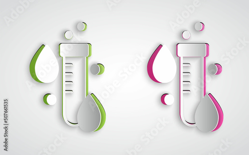 Paper cut Test tube with water drop icon isolated on grey background. Paper art style. Vector
