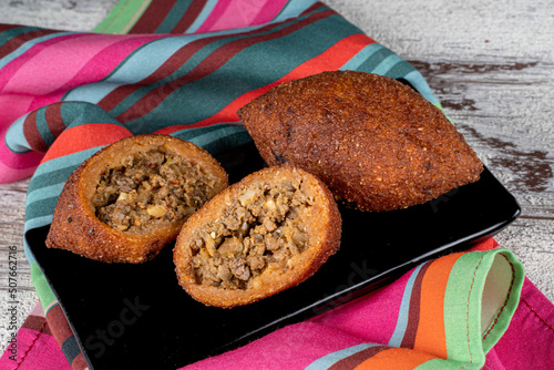 Kibbeh is a popular dish in Middle Eastern cuisine (Turkish name; icli kofte) photo