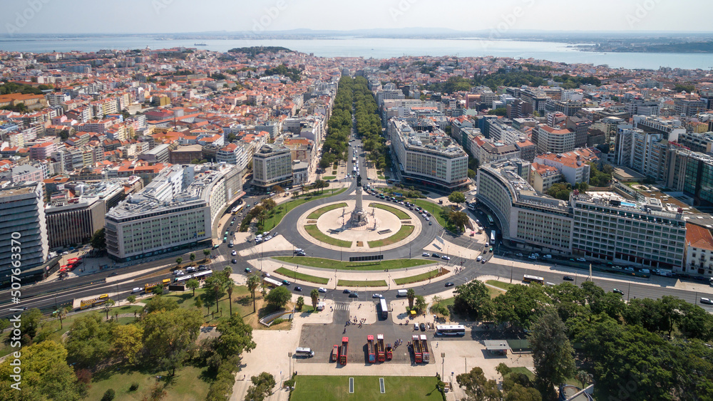 Aerial view of Marques de Pombal square and Liberdade Avenue during summer in Lisbon, Portugal.