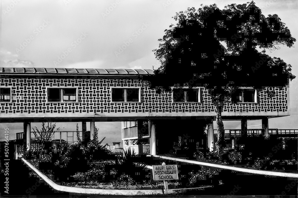 A black and white photo of the Aburi Girls Senior High School in the