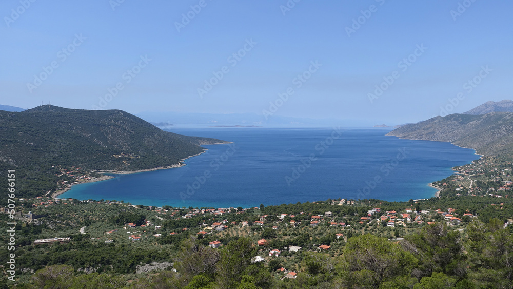 Beautiful bay and beach of Porto Germeno as seen from distance, Attica, Greece